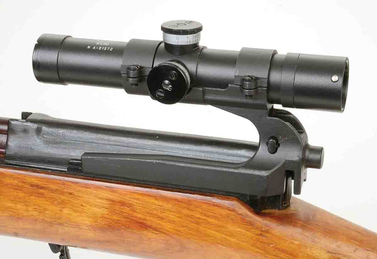 The Soviet SVT40s were fitted with optics for sniper use if there was a machined slot at the rear of the receiver for the mount’s cross pin.